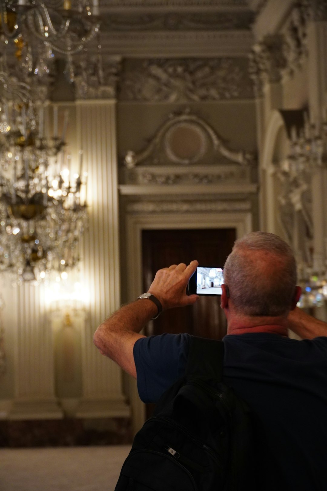 Photographers with cameras capturing a celebrity arrival