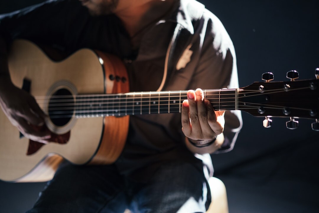 musician playing guitar